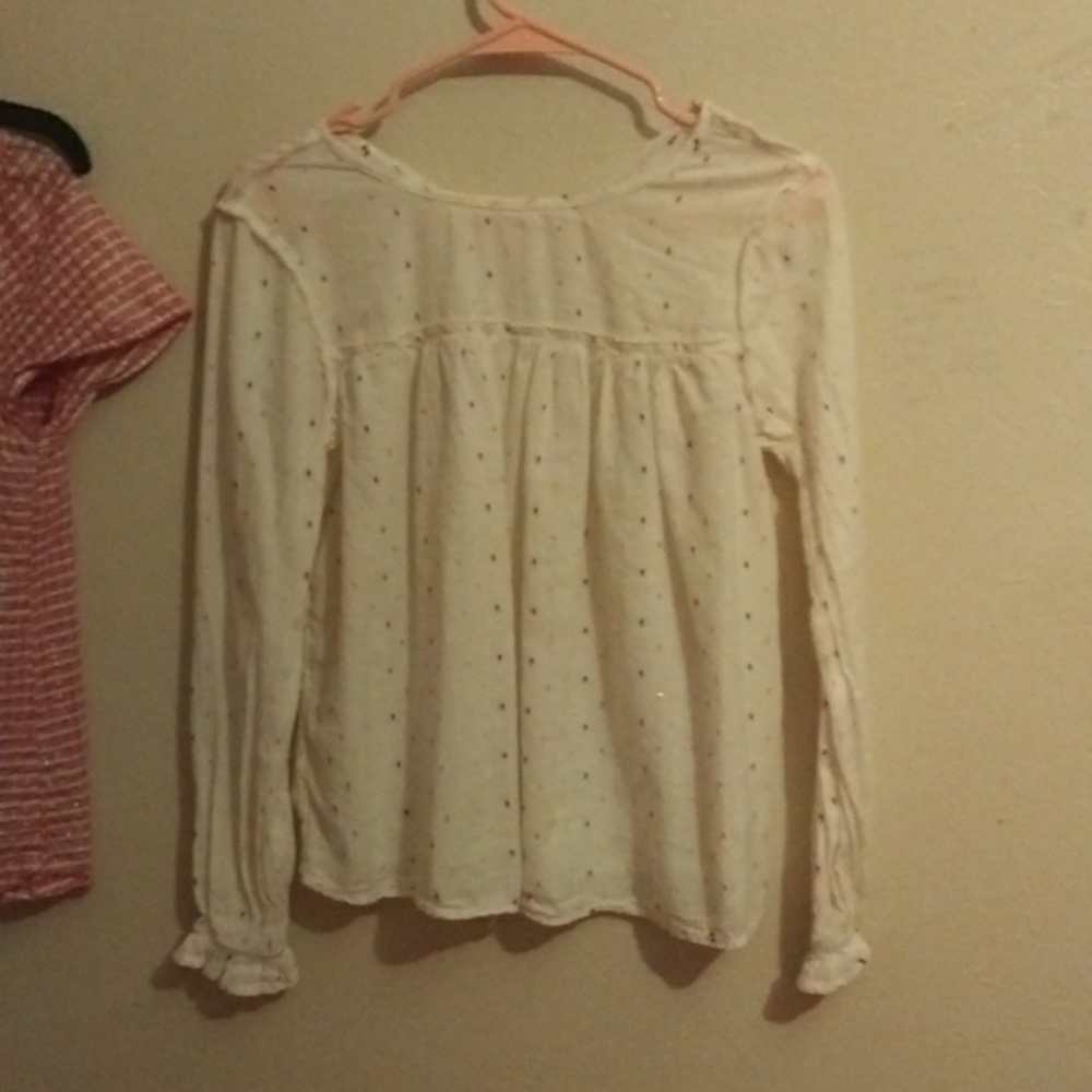 A white long sleeve blouse